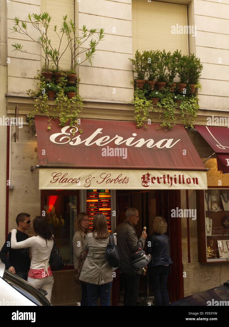 People standing outside Esterina ice cream shop, Paris, France Stock Photo