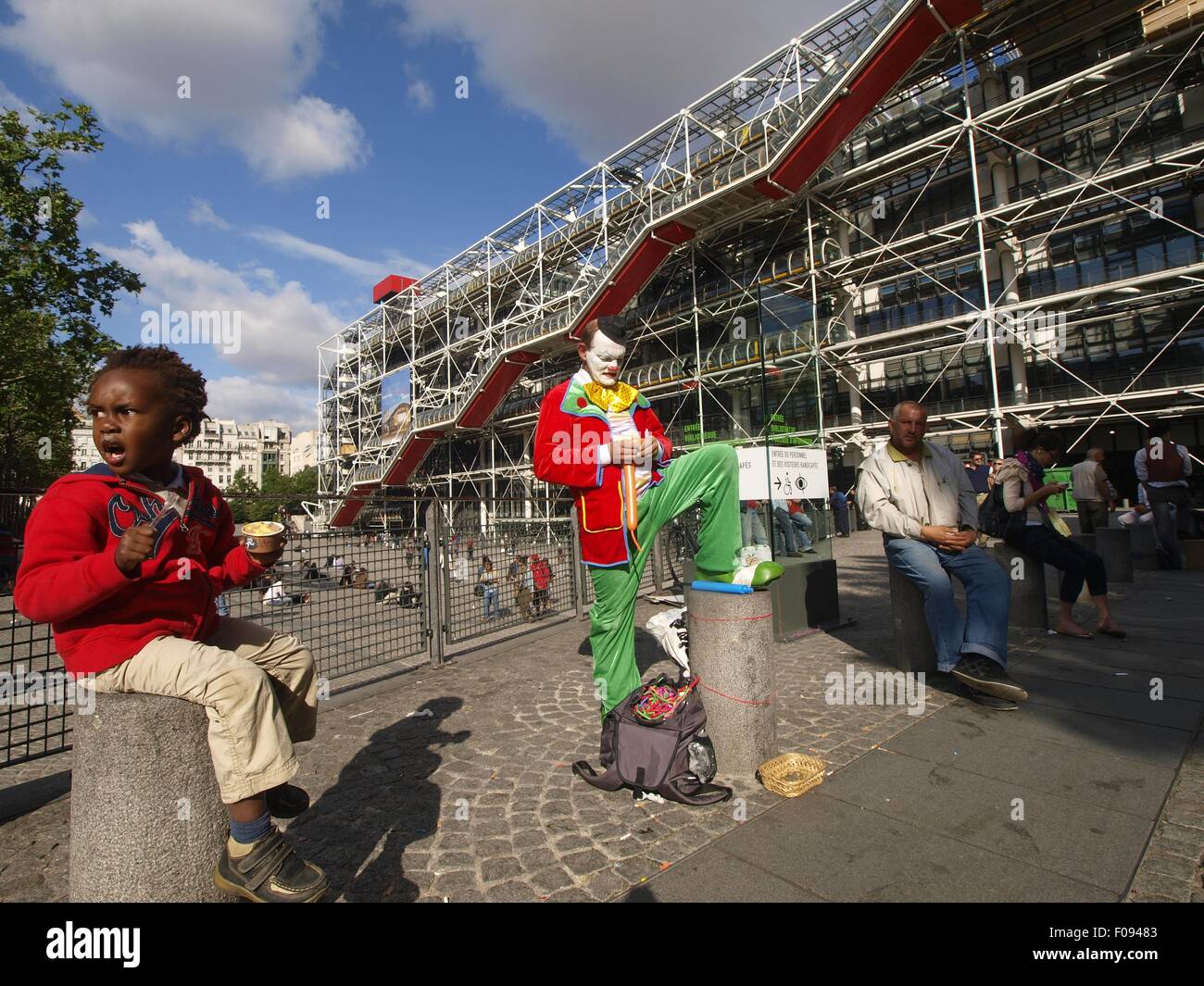 Clown standing outside Centre Georges Pompidou Library in Paris, France Stock Photo