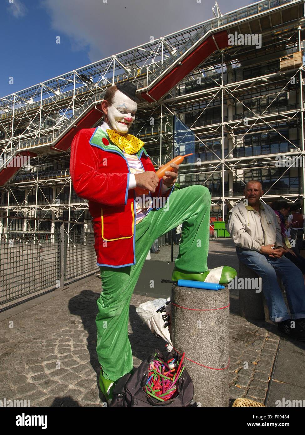 Clown standing outside Centre Georges Pompidou Library in Paris, France Stock Photo
