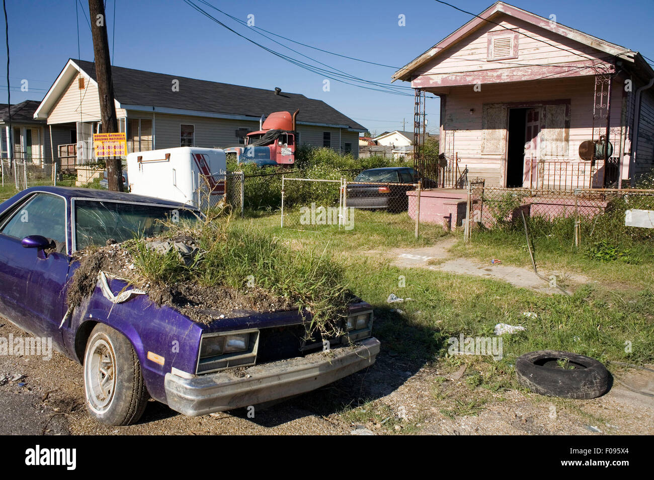 Sep 20, 2006; New Orleans, LA, USA; Grass growing out of the hood of an abandoned car in the Lower 9th Ward of New Orleans, LA. The neighborhood was abandoned after flooding from nearby canals after Hurricane Katrina inundated this part of the city. Mandatory Credit: Photo by Jack Kurtz/ZUMA Press. (©) Copyright 2006 by Jack Kurtz Stock Photo