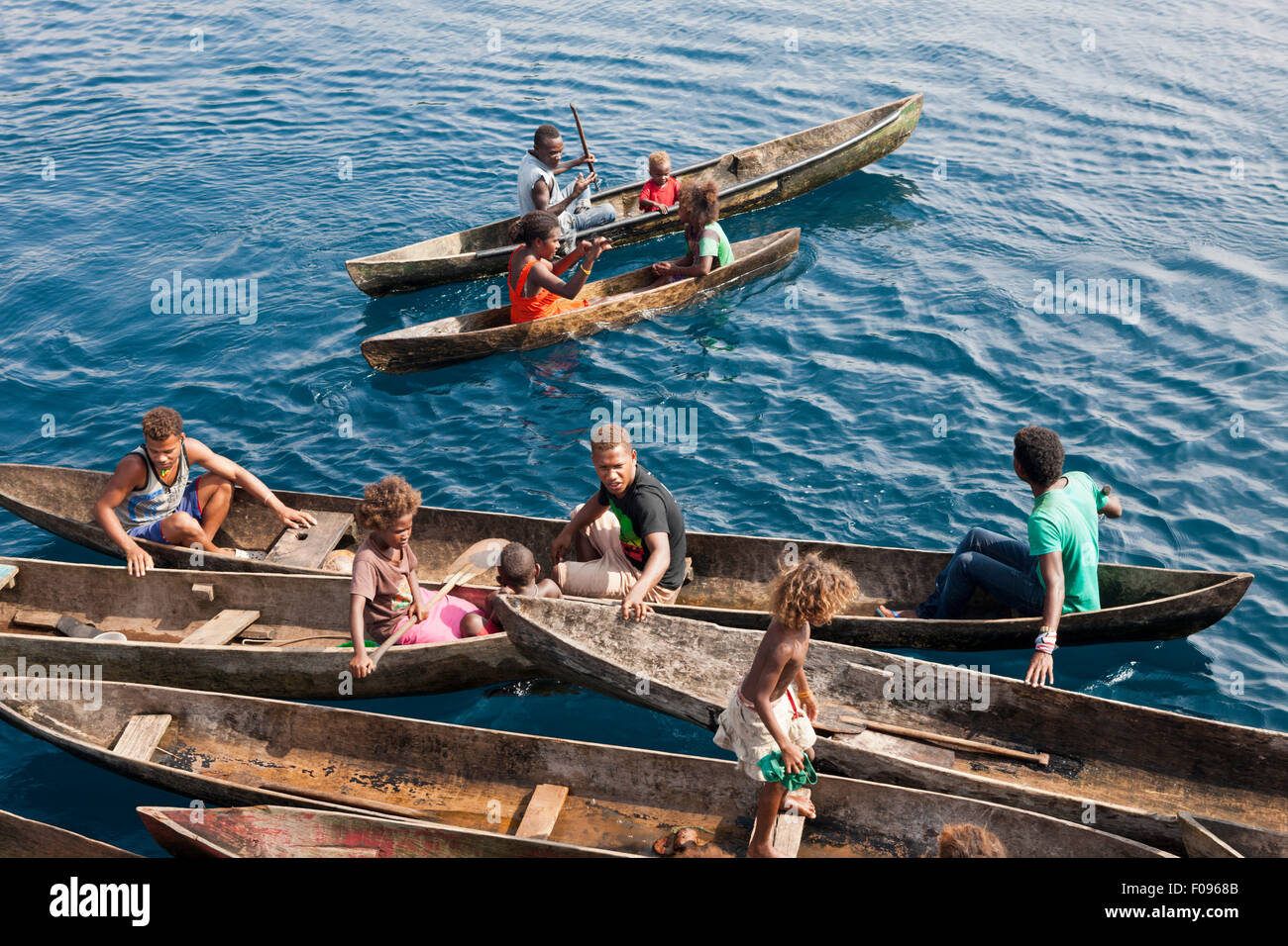 Local People in typical Dugout Canoe, Florida Islands, Solomon Islands Stock Photo