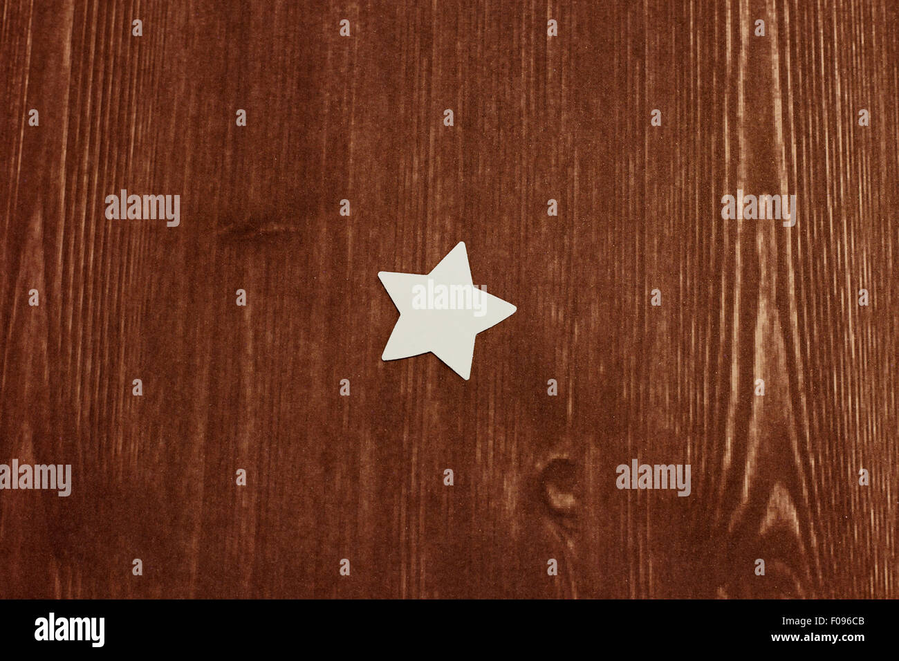 paper star on wood texture Stock Photo - Alamy