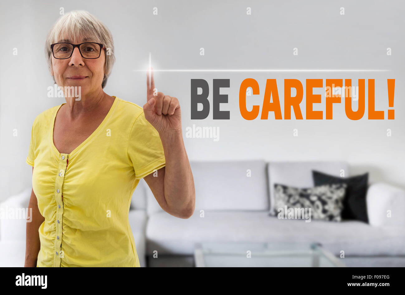 be careful touchscreen is shown by senior. Stock Photo