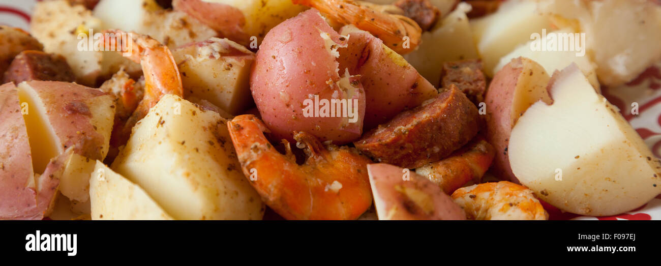 Shimp, potatoes, and sausage make up a spicy low country boil Stock Photo