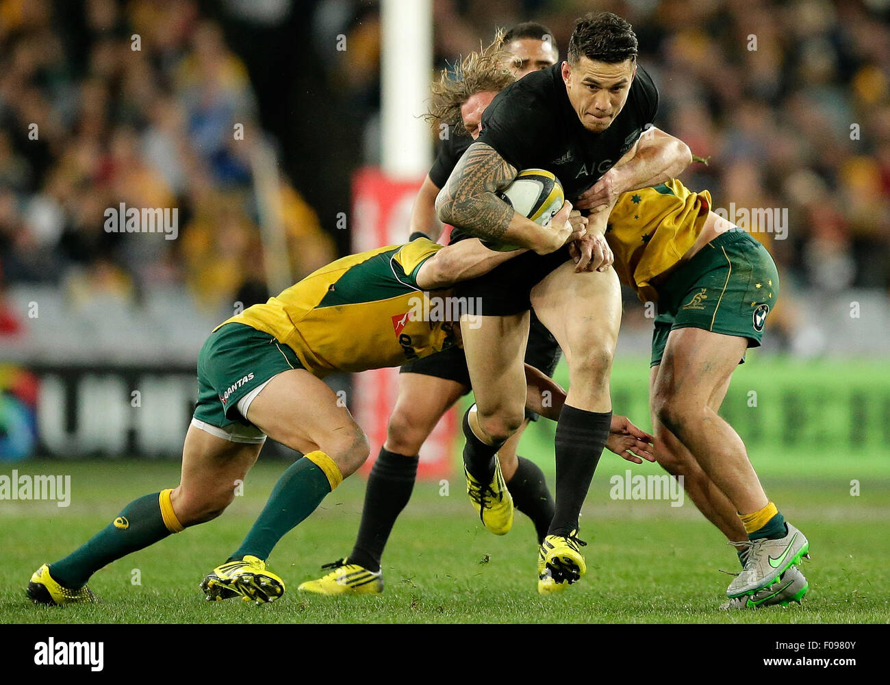 Sydney, Australia. 08th Aug, 2015. Sonny Bill Williams of the All Blacks is tackled by Michael Hooper of the Wallabies during the Bledisloe Cup match between the Wallabies and the All Blacks at ANZ Stadium, Sydney, Australia. © Action Plus Sports/Alamy Live News Stock Photo