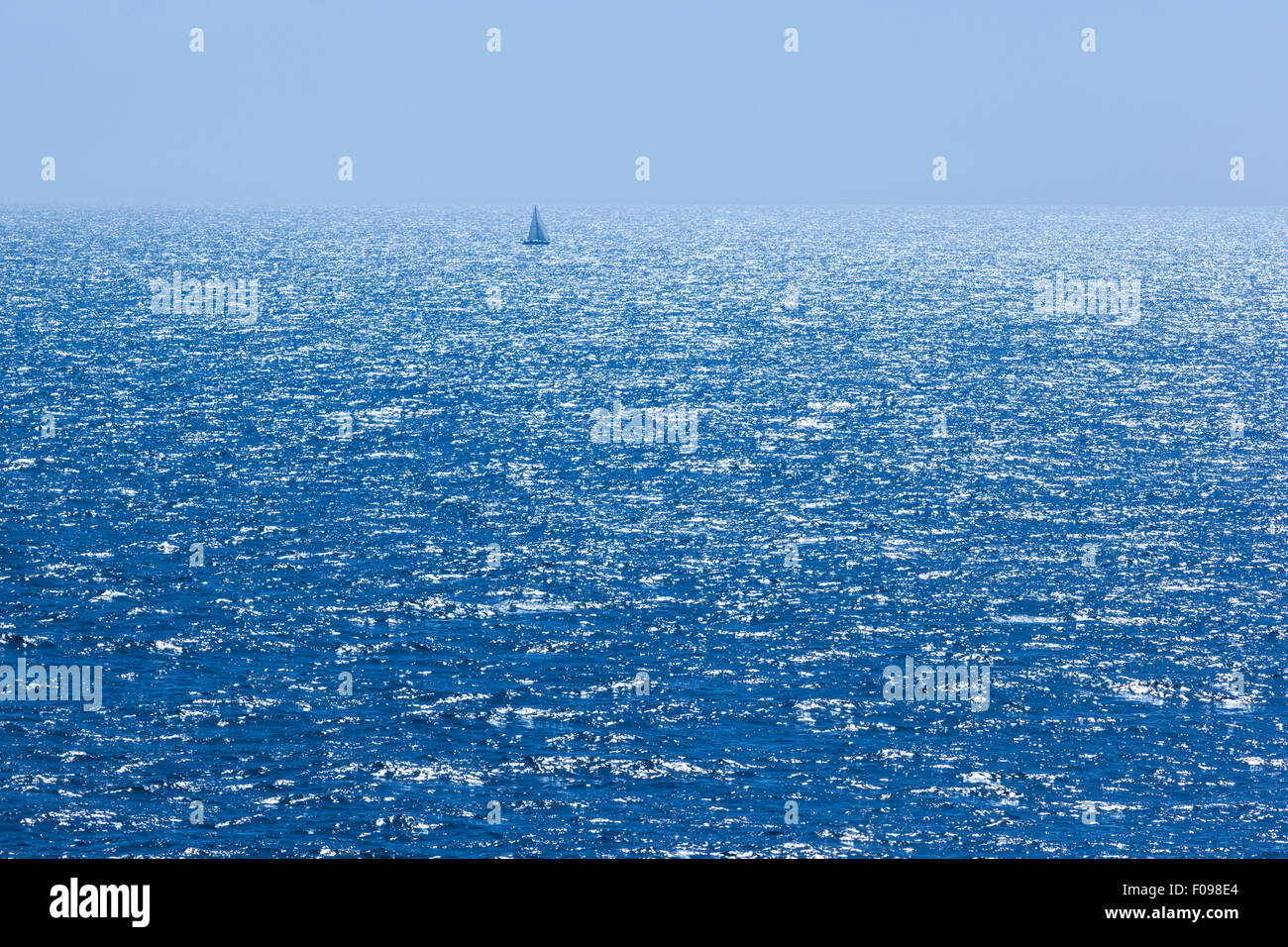 Sunlight shimmering on a blue sea in The English Channel Stock Photo