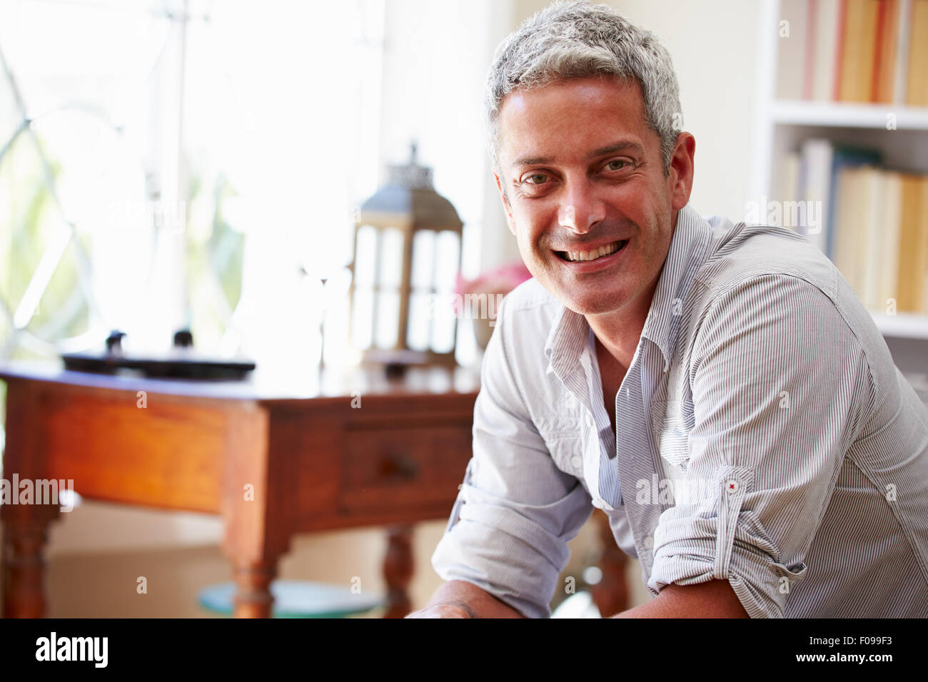 Portrait Of A Smiling Grey Haired Man Stock Photo Alamy