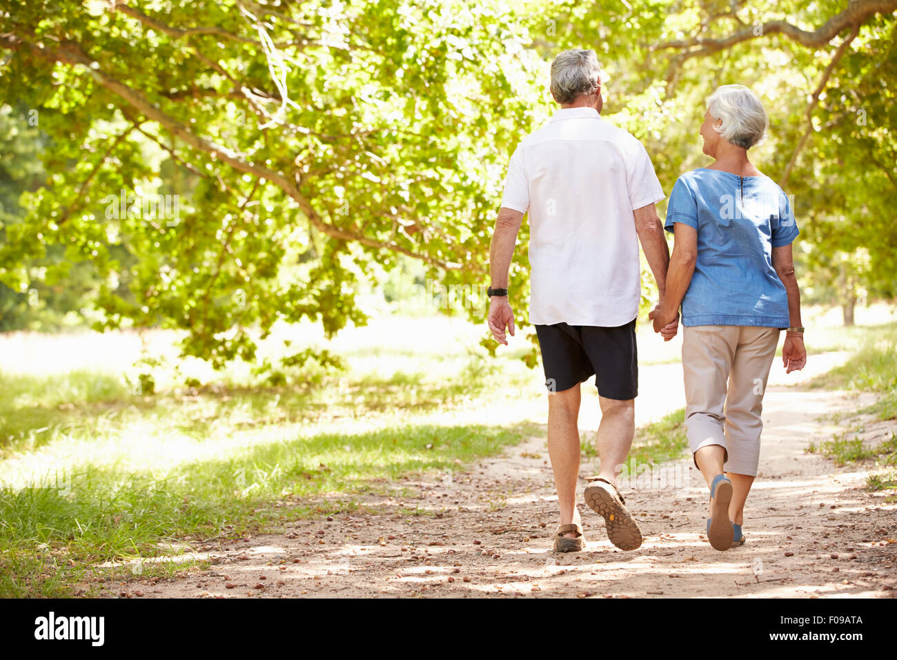 Back view man walking other hi-res stock photography and images - Alamy