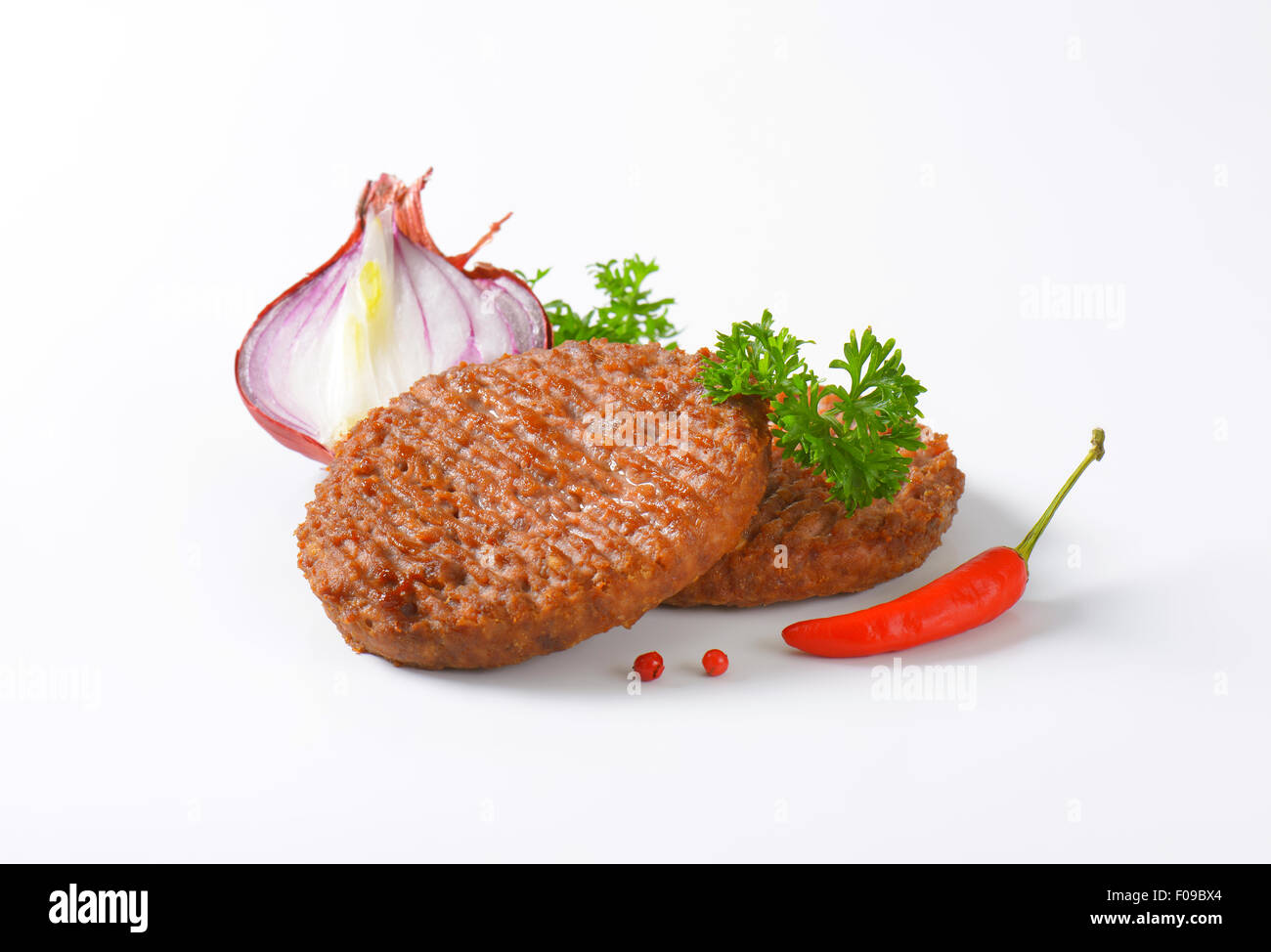 Two Grilled Beef Burger Patties Stock Photo Alamy