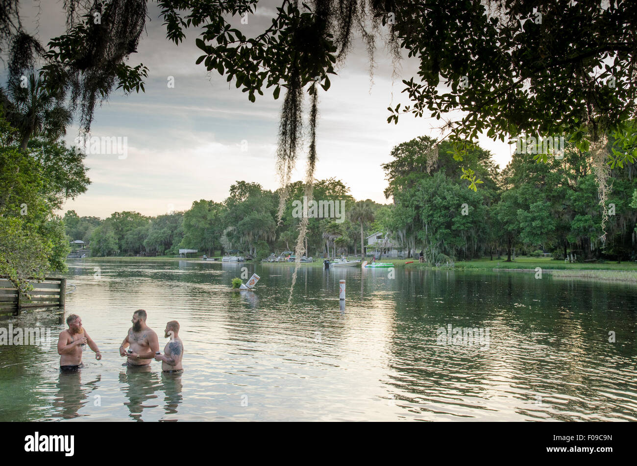 Men wading at Rainbow River State Park Florida. Stock Photo