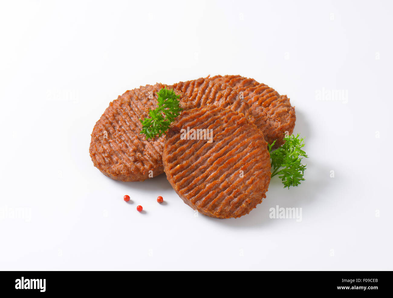 Three Grilled Beef Burger Patties Stock Photo Alamy