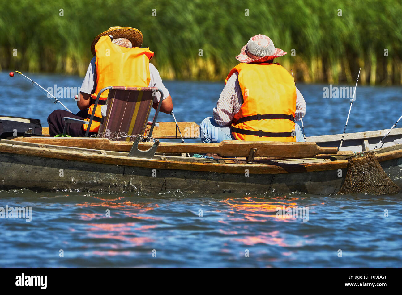 Two people fishing in boat hi-res stock photography and images - Alamy