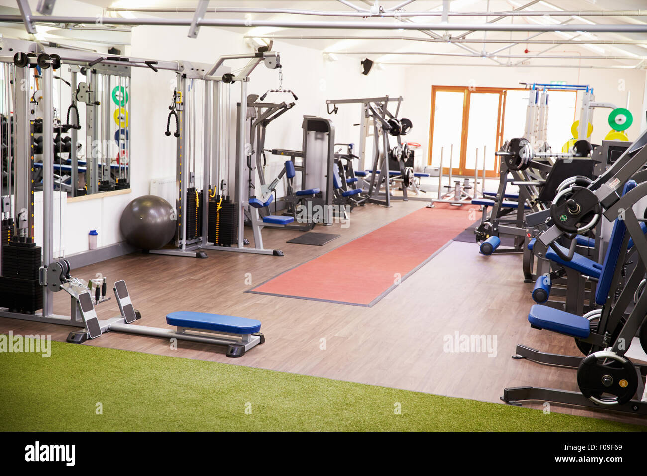 Interior of a gym with fitness equipment Stock Photo
