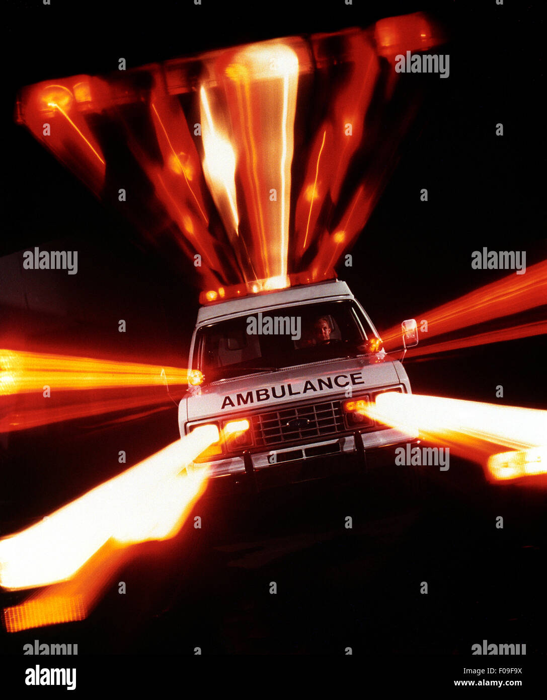 Its emergency lights on, an ambulance on an emergency call speeds