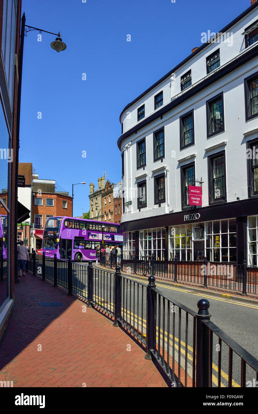 Purple Reading bus turning into Minster Street, Reading, Berkshire, England, United Kingdom Stock Photo
