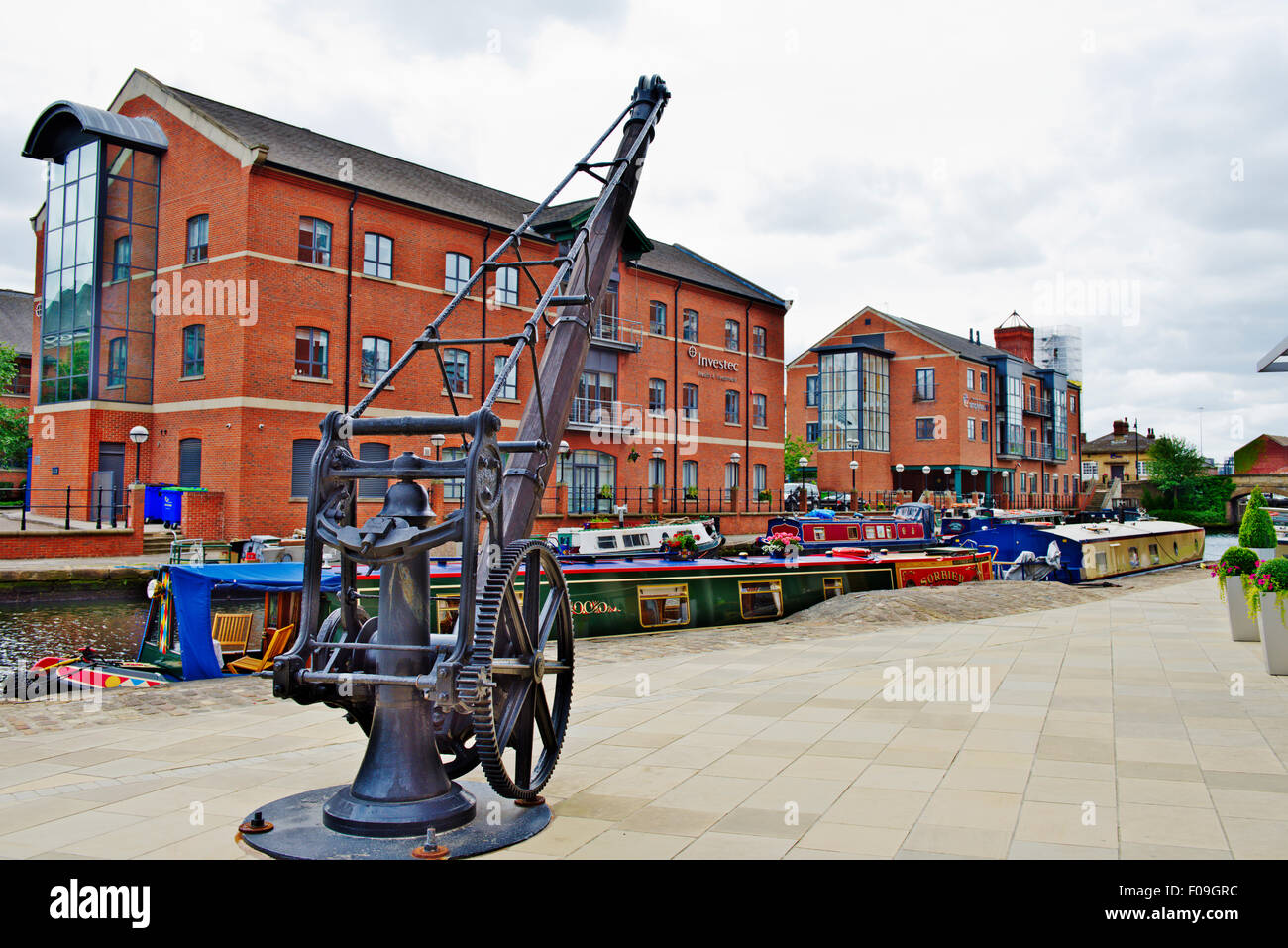 Central Leeds Riverside and Quayside houses office buildings by Leeds Dock restored cargo crane Stock Photo