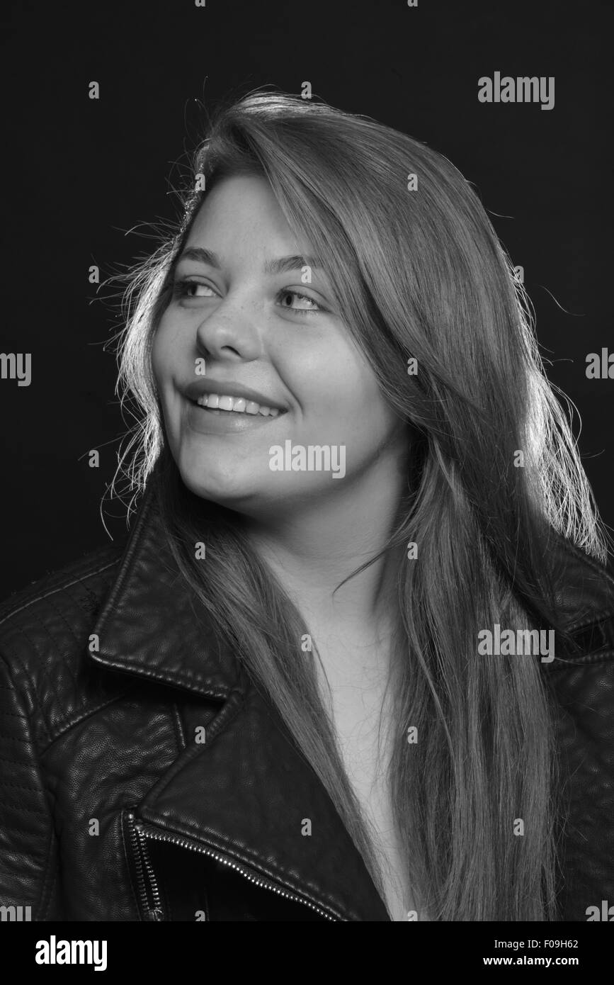 Smiling teenage girl portrait, Hounslow, Greater London, England, United Kingdom Stock Photo