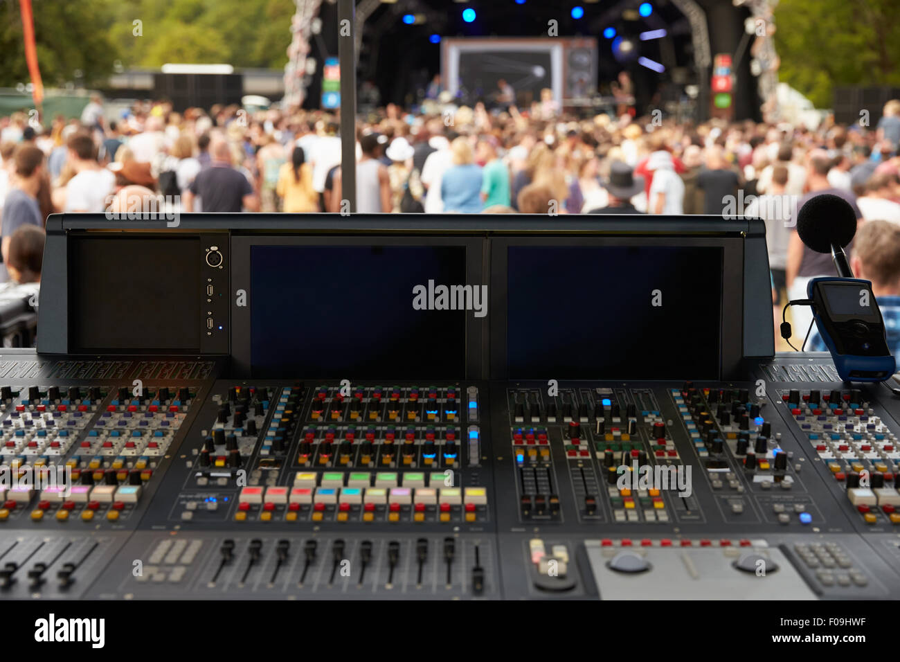 Sound and lighting desk at an outdoor festival concert Stock Photo
