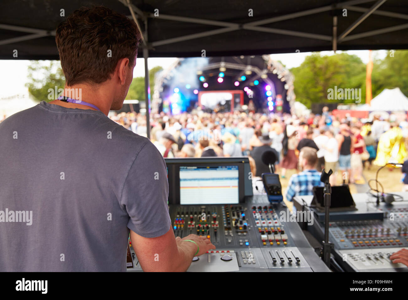 Sound and lighting engineer at an outdoor festival concert Stock Photo