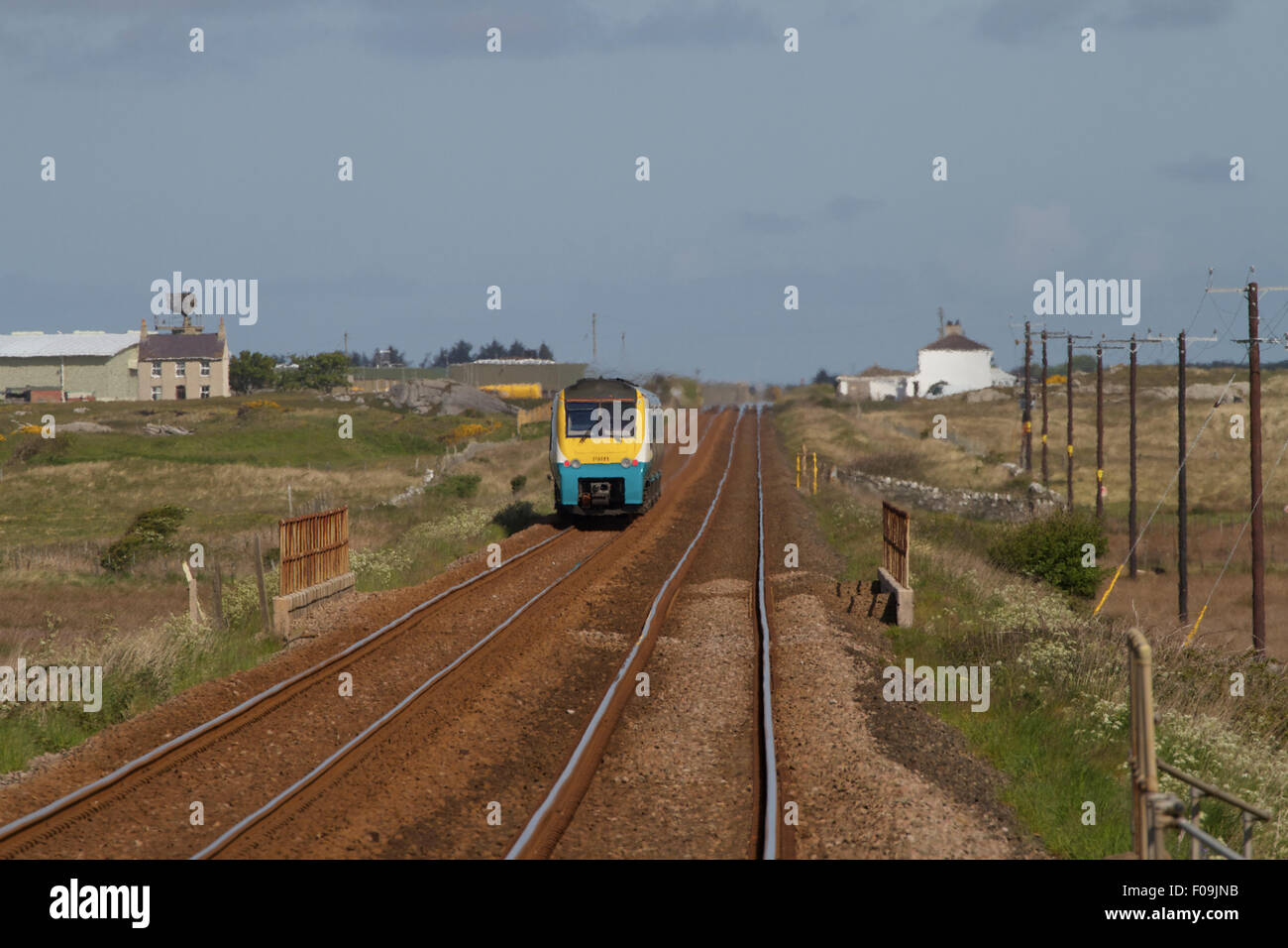 Train approaching Rhosneigr Station. Anglesey, Wales Stock Photo Alamy