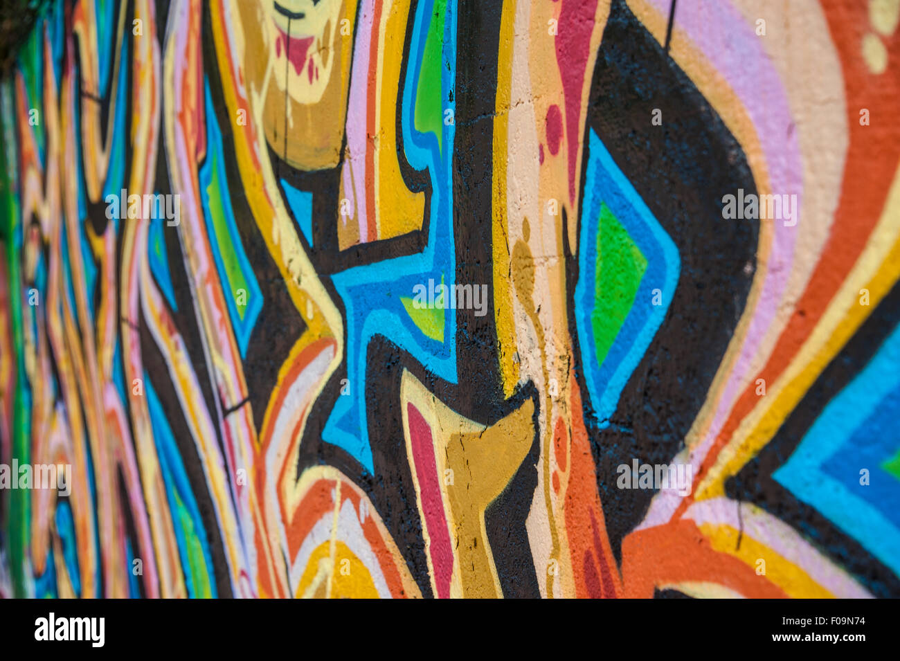 Closeup view of colorful graffiti on a wall in Asheville, North Carolina's River Arts District. USA. Stock Photo