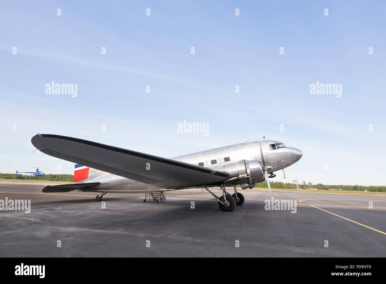 Small aircraft with the norwegian flag parked in an empty airport Stock Photo