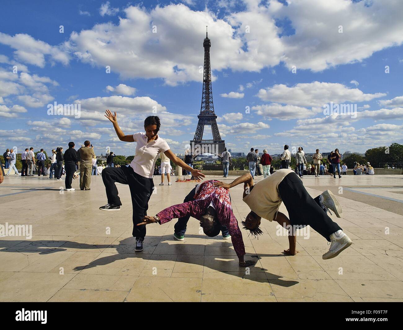 Dancers performing in front of Eiffel Tower, Paris, France Stock Photo