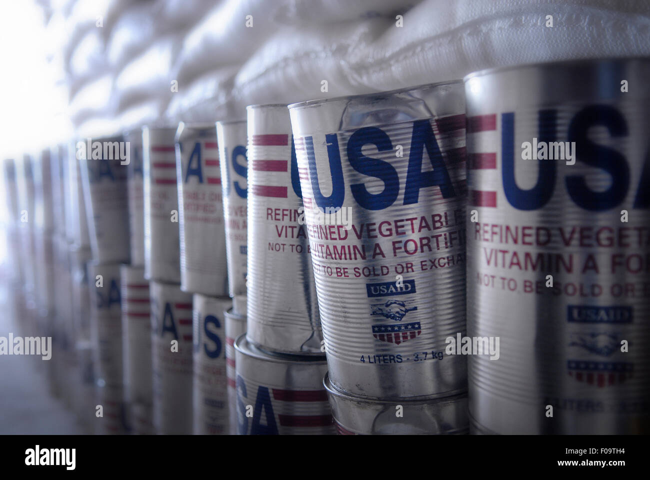 Packed cans of refined vegetable oil from United States Agency for International Development ( USAID ) in a storage warehouse of World Food Programme WFP in the city of Goma, North Kivu, DR Congo Africa Stock Photo