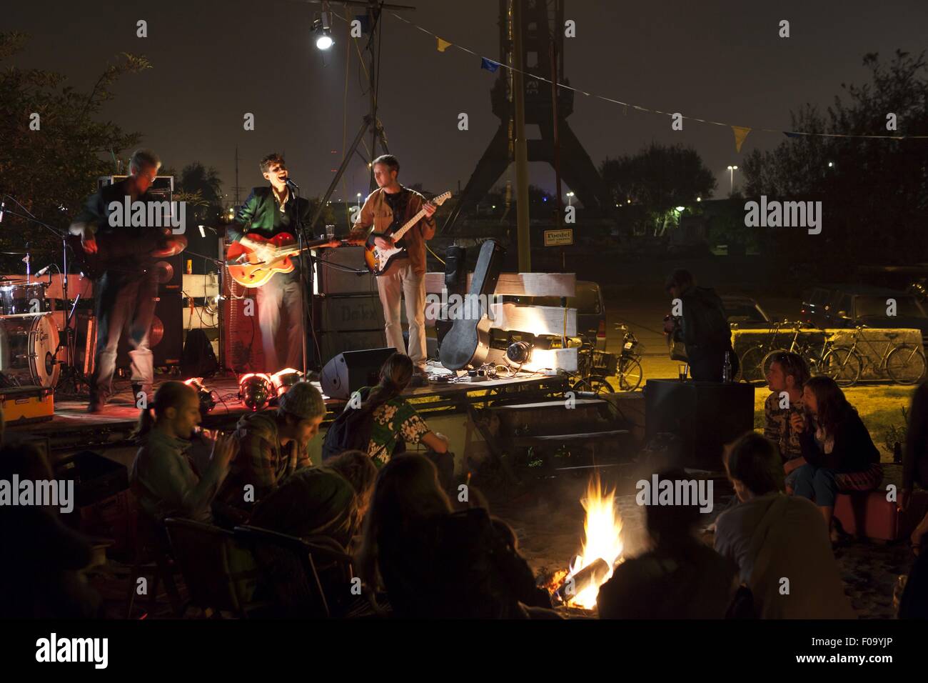 People at concert outside Noorderlicht Cafe, NDSM shipyard, Noord, Amsterdam, Netherlands Stock Photo