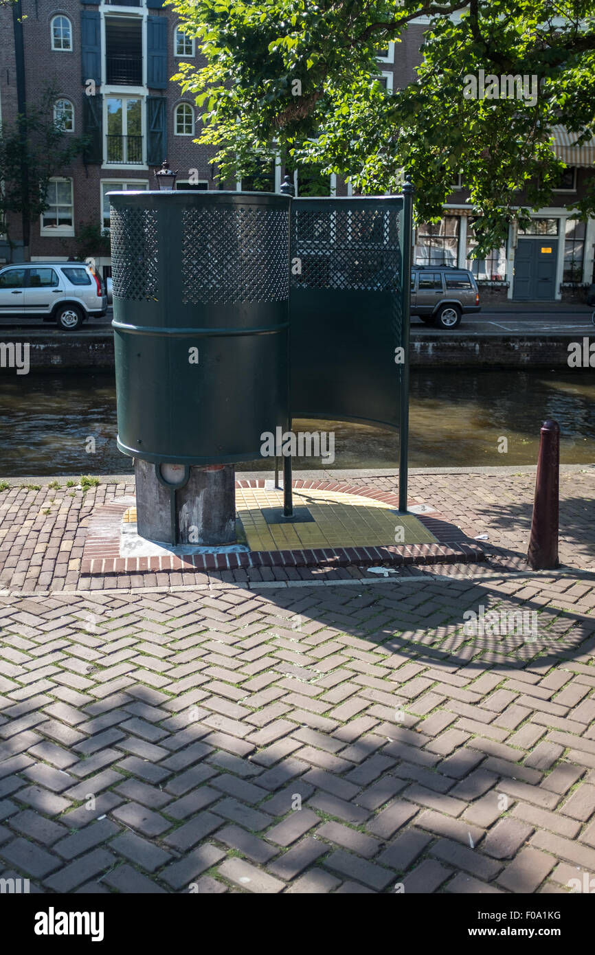 Open air urinal on the street in Amsterdam Holland Stock Photo