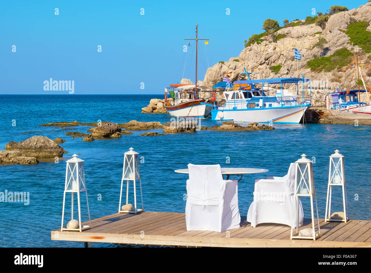 Cafe on a coast. Kolymbia. Rhodes, Greece Stock Photo