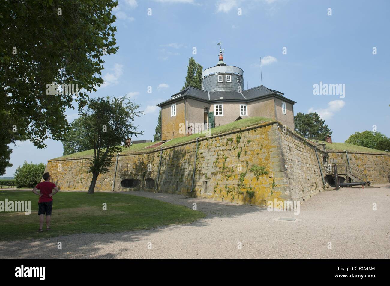Tourist standing in front of fort at Steinhude, Lower Saxony, Germany Stock Photo