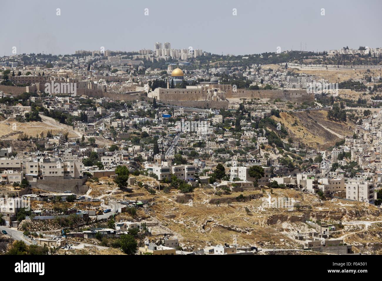 View of cityscape, Temple Mount, Dome of the Rock, and City Wall in Jerusalem, Israel Stock Photo