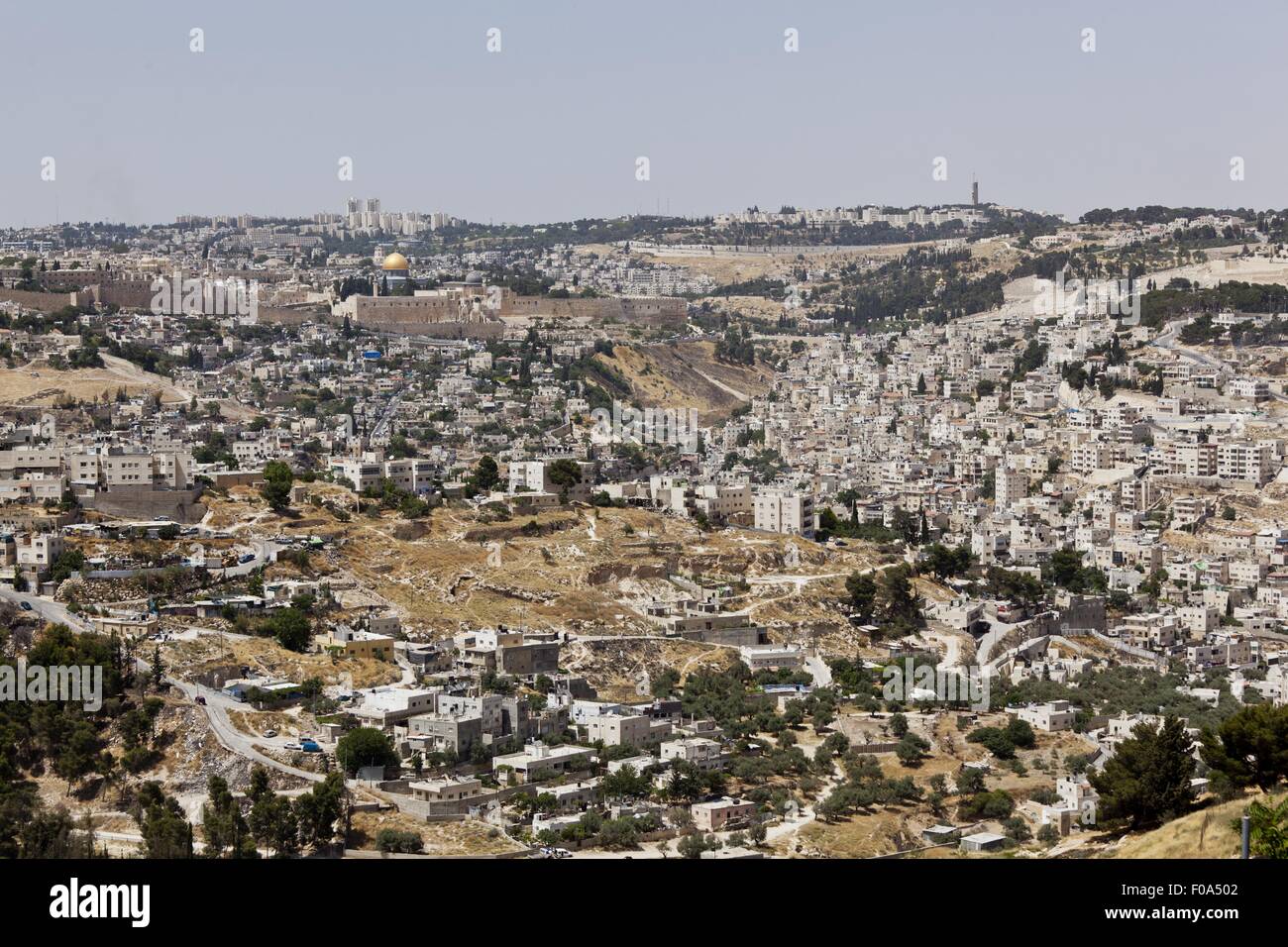 View of cityscape, Temple Mount, Dome of the Rock, and City Wall in Jerusalem, Israel Stock Photo