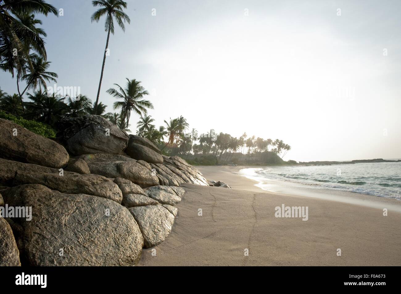 View of palm trees and Tangalle beach in Hambantota District, Southern Province, Sri Lanka Stock Photo