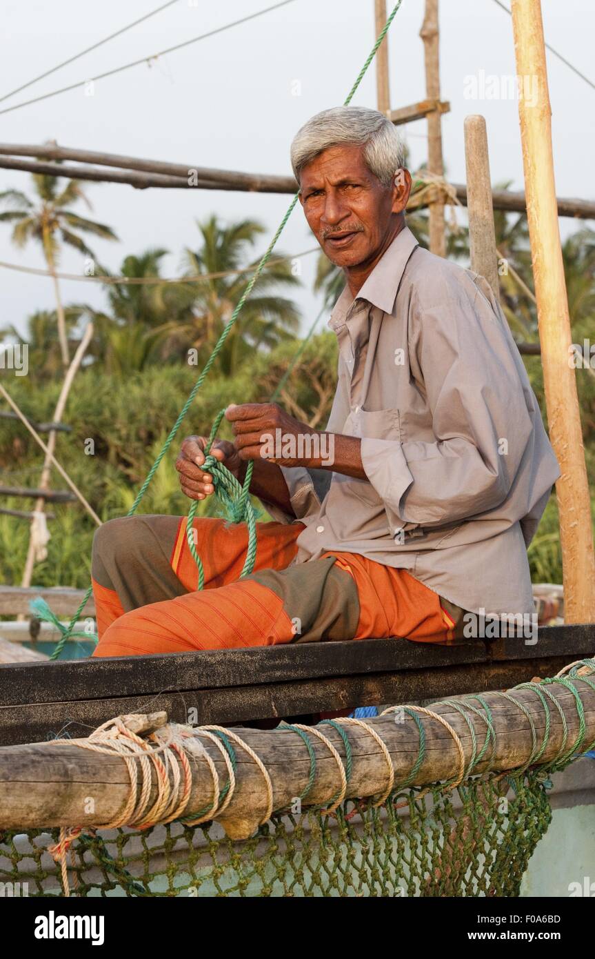 Man sitting on a boat hi-res stock photography and images - Alamy