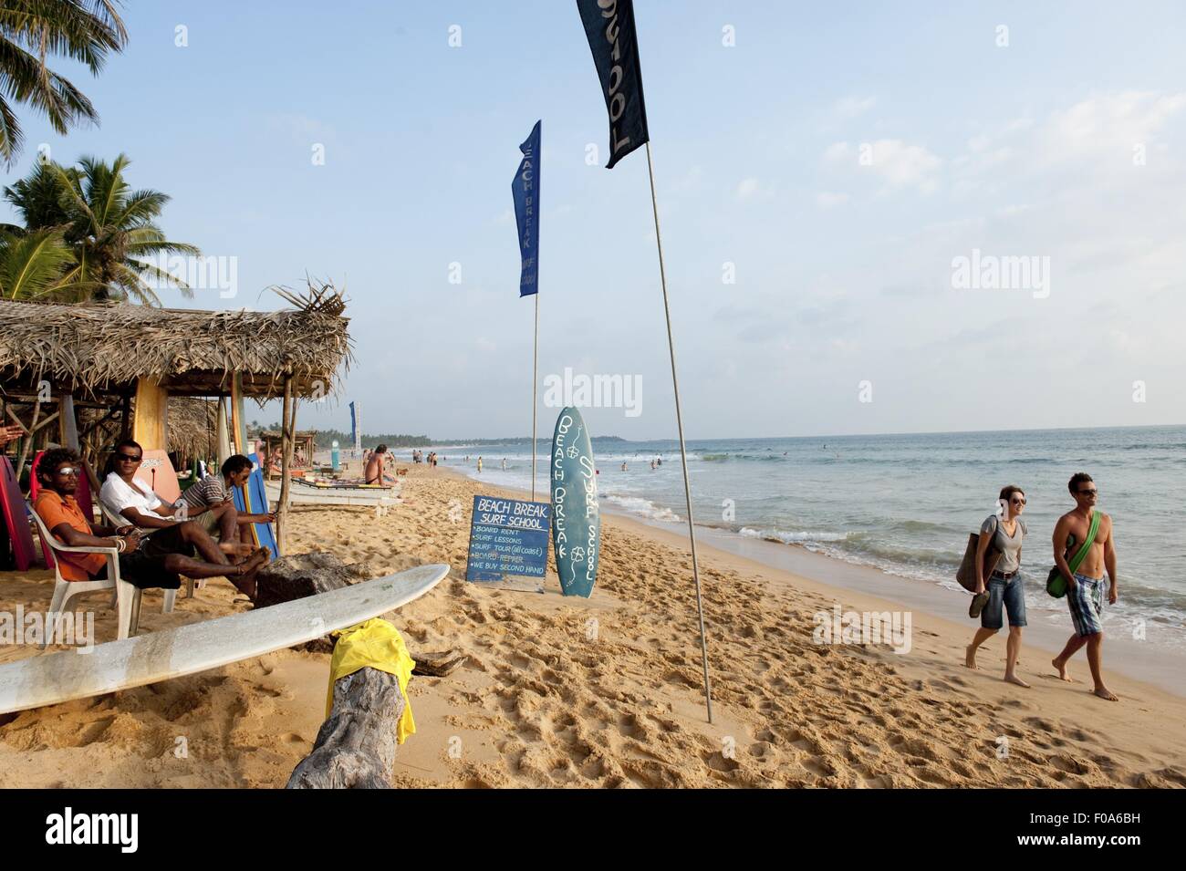 People at Hikkaduwa beach, Sri Lanka Stock Photo