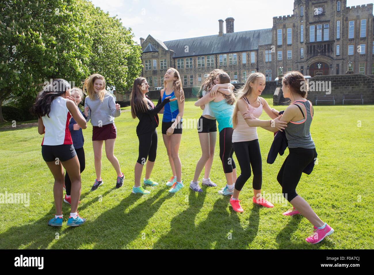 Group of students taking break in field Stock Photo Alamy