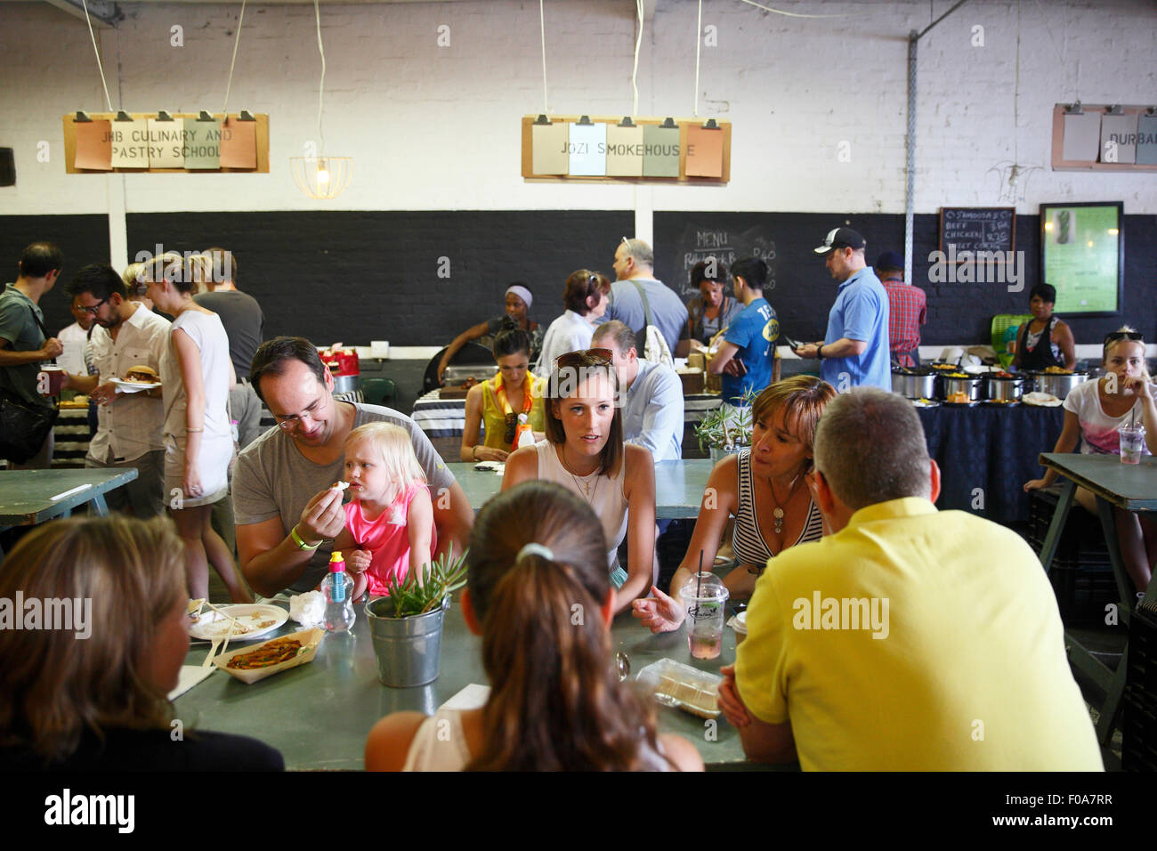 South Africa, Johannesburg, Maboneng Precinct, Arts on Main. Dinners at the Sunday food market.  Photo: © ZuteLightfoot Stock Photo