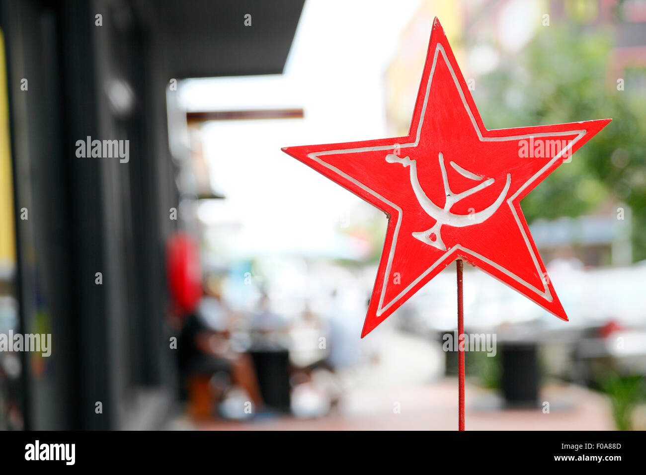 South Africa, Johannesburg, Maboneng Precinct. Cocktails and communism sign advertising a bar in Main Street Life. Stock Photo