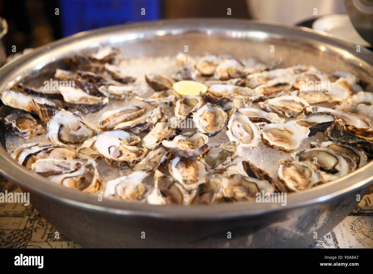 South Africa, Johannesburg. Selling oysters at the Neighbourgoods market held in the Braamfontein area of the city centre. Stock Photo