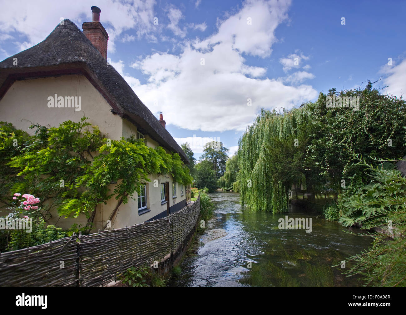 Thatched Cottage alongside the River Test, Wherwell, Hampshire, England