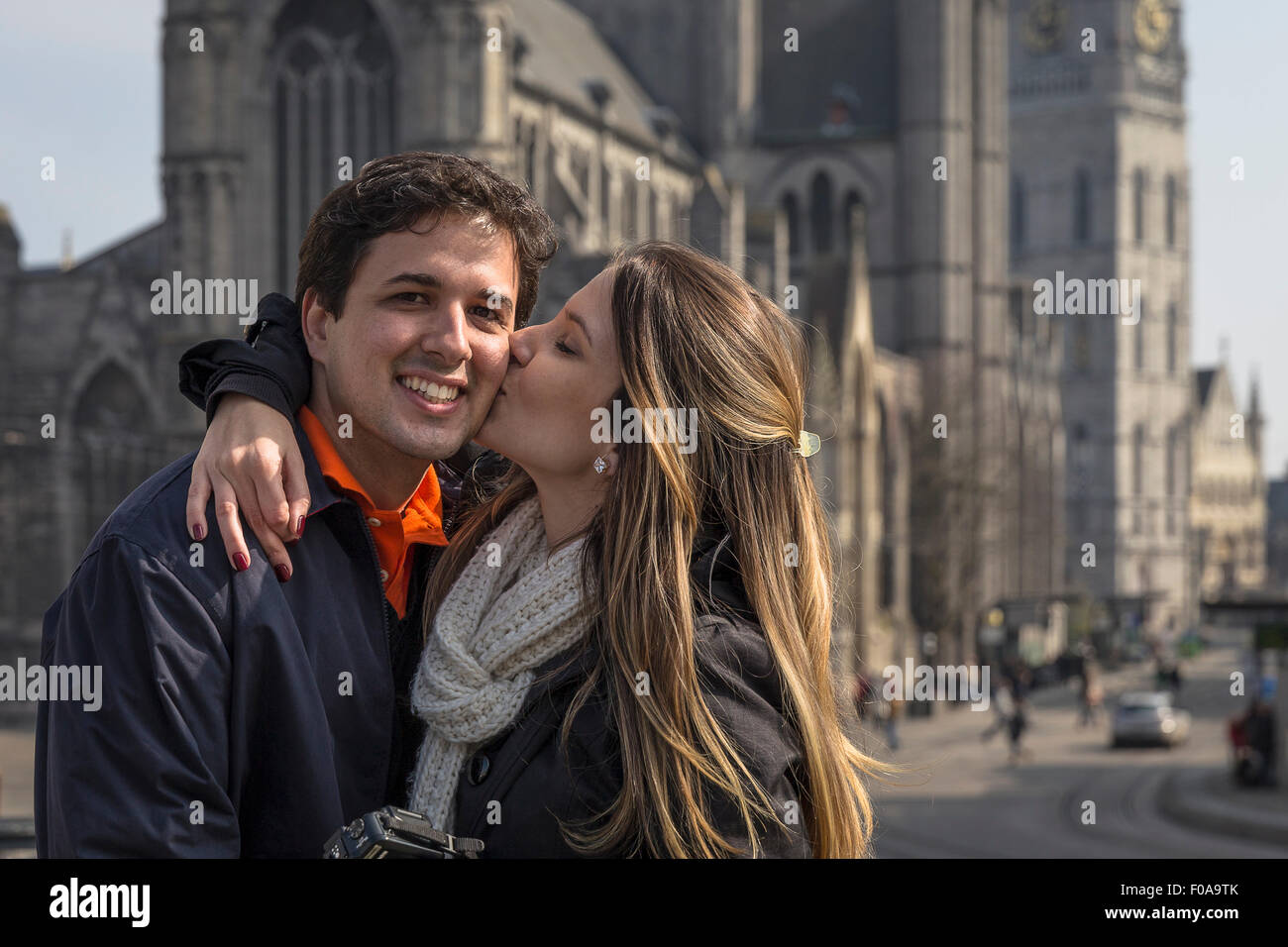 Romantic couple in front of St Bavo's Cathedral, Ghent, Flanders, Belgium Stock Photo