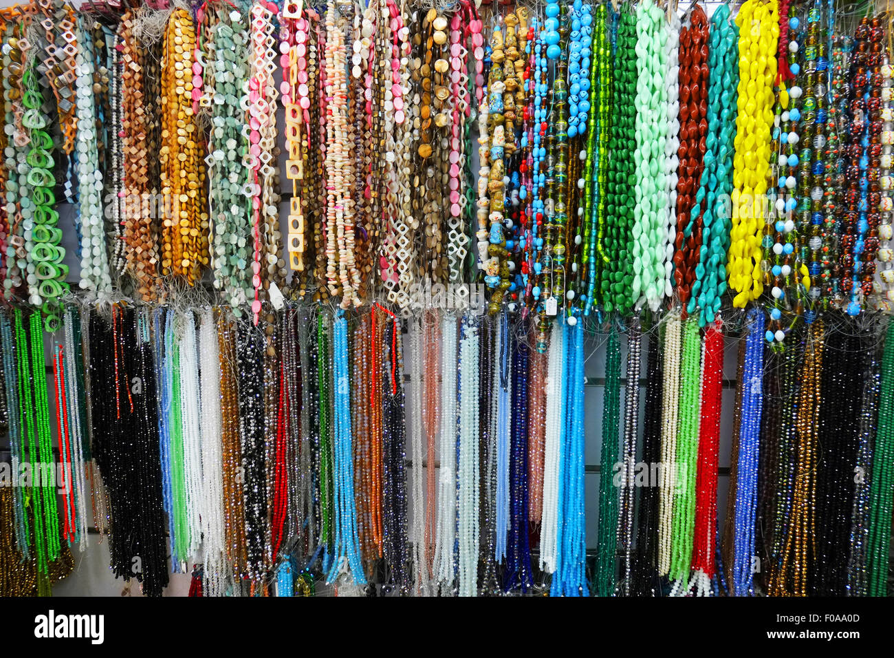 COLOURFUL BEAD NECKLACES IN SHOP Stock Photo