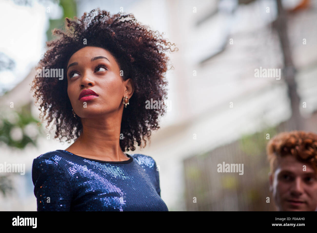 Young woman, outdoors, looking away Stock Photo