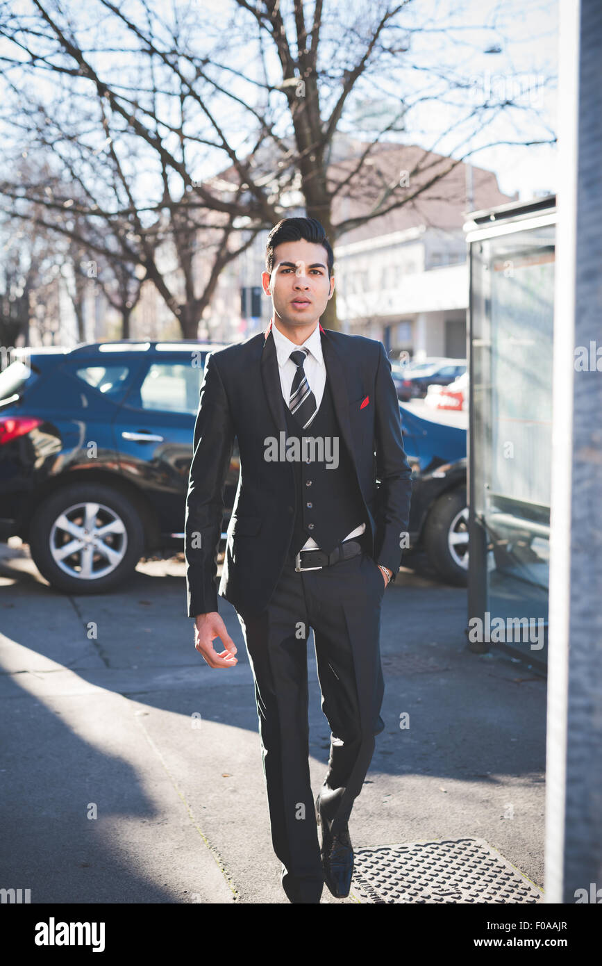 Young businessman in the street, Milan, Italy Stock Photo