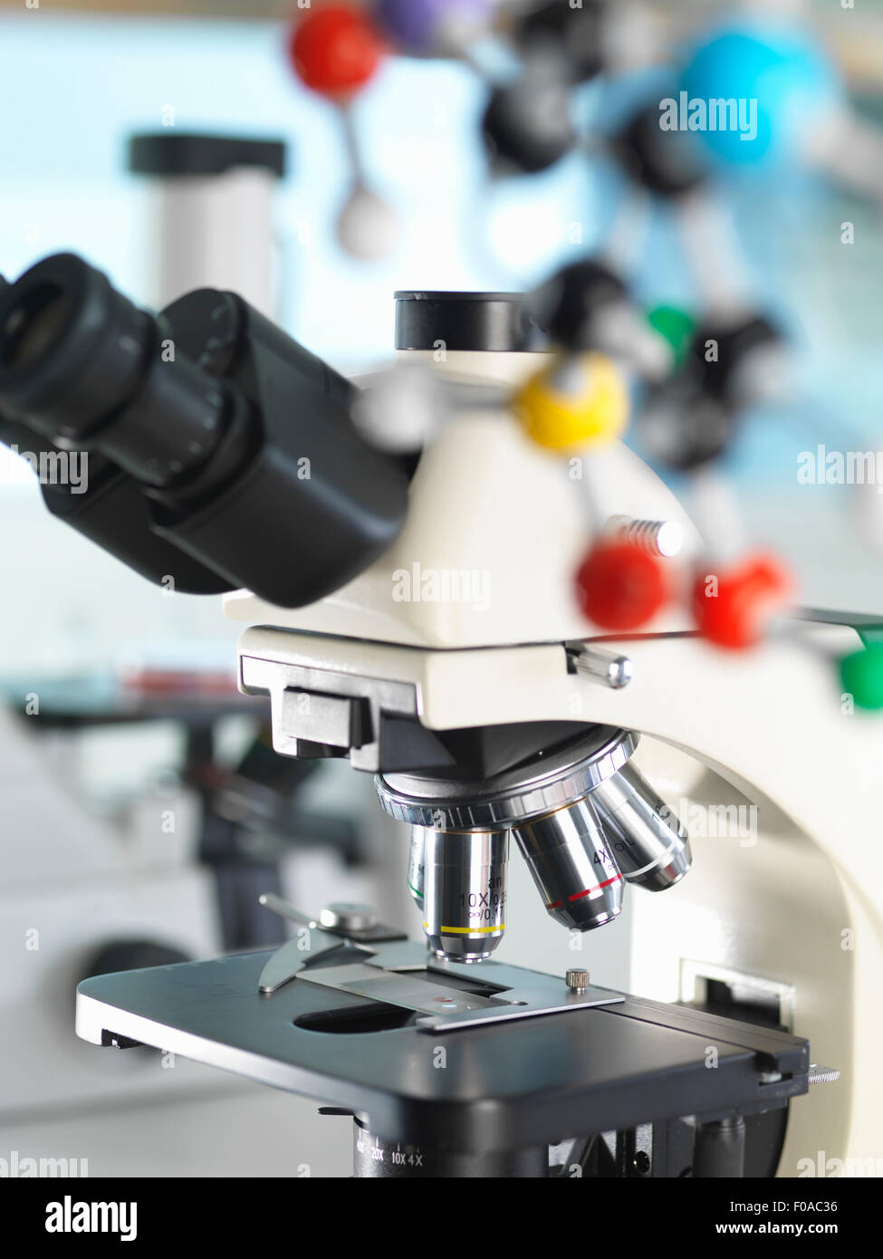 Microscope viewing sample with a ball and stick molecular model
