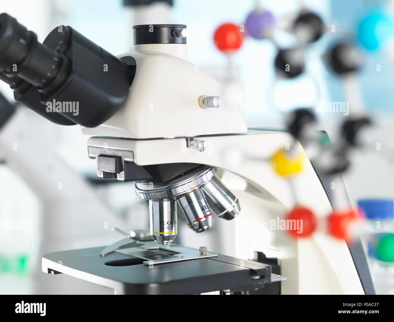 Microscope viewing sample with a ball and stick molecular model