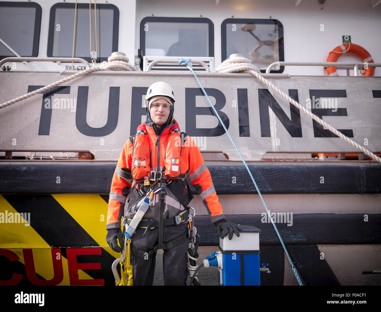 Portrait of offshore windfarm engineer in port Stock Photo