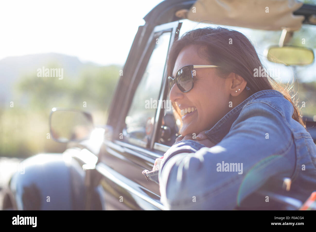 Mature woman in convertible car Stock Photo